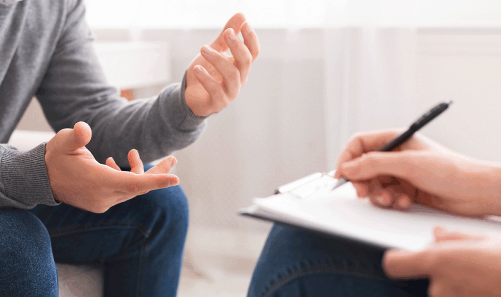 a patient experiencing medical detox with a doctor